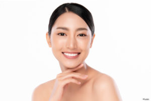 woman after receiving a microneedling treatment